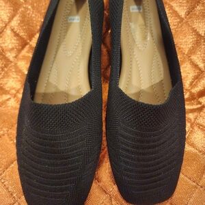 Black flat loafer